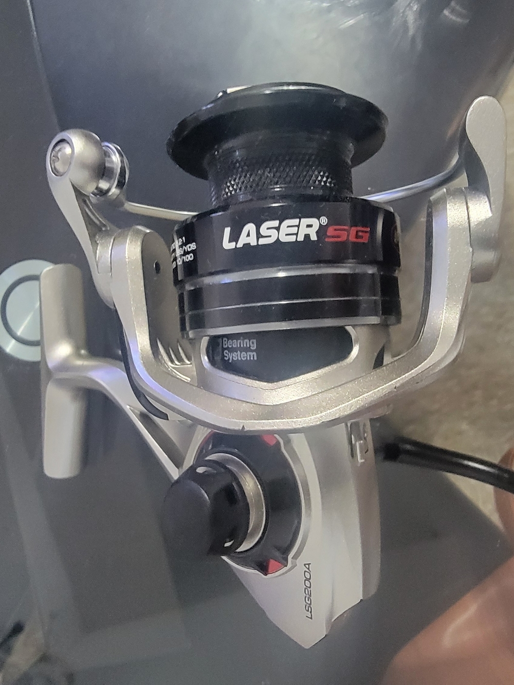 Laser SG Silver and Black Spinning Reel -